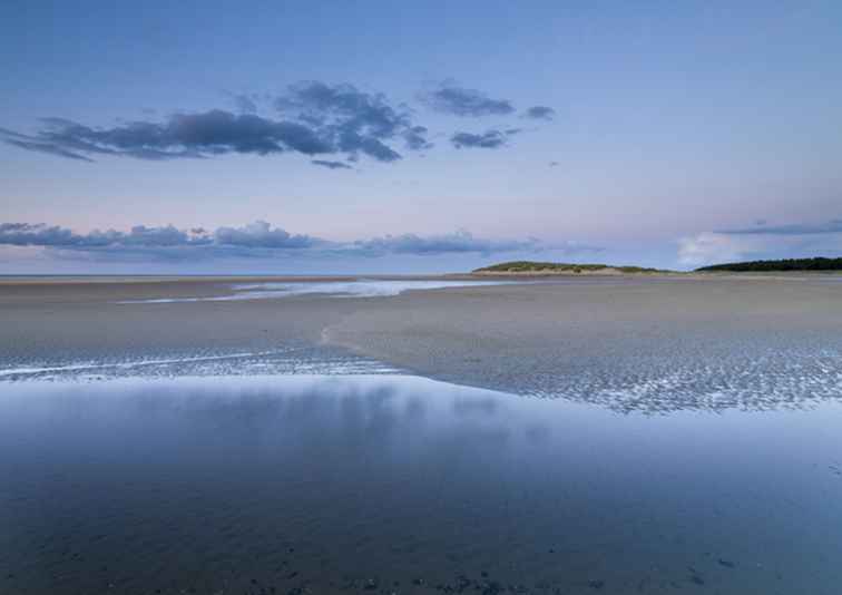 Naaktzwemmen in Holkham Bay in Norfolk / Engeland